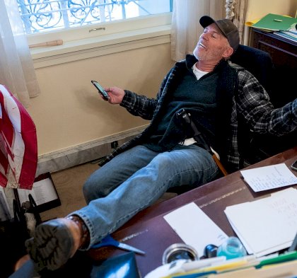 37776806-9129299-The_MAGA_rioter_who_put_his_feet_up_on_Nancy_Pelosi_s_desk_was_a-a-94_1610218041127[1].jpg