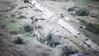 Small detachement of Ukrainian mechanized infantry assaults a Russian trench position in Kherson region, Russian soldiers just run away, unclear from which date, almost certainly an older video.mp4