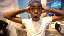 surprised-black-kid.gif