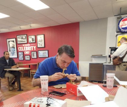 Former president Jair Bolsonaro eating KFC in Florida on the day his opponent took office in Brazil.jpg