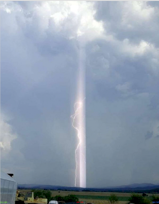 PERHAPS THIS IS AN EXTRATERRESTRIAL WEAPON- THE SUN'S RAYS WOULD SPREAD ITS LIGHT RAYS WIDER THAN THIS LIGHT BEAM, IF THEY TRAVELED AS ON THIS IMAGE.png