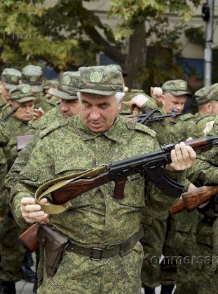 Russian conscript inspects his new Rifle.jpg
